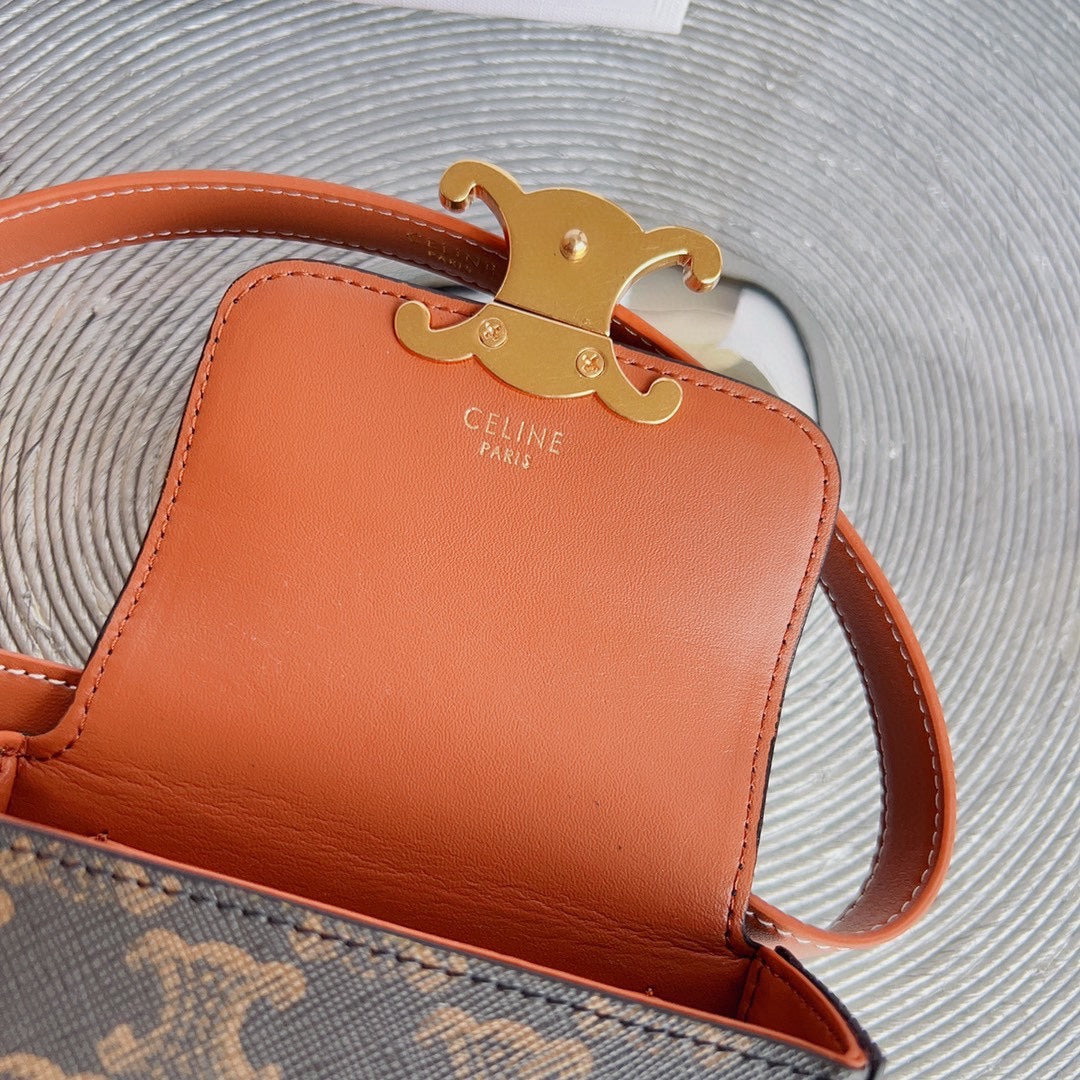 CL BELT MONOGRAM BROWN BAG TRIOMPHE 25 MM BELT TRIOMPHE ORANGE CALFSKIN